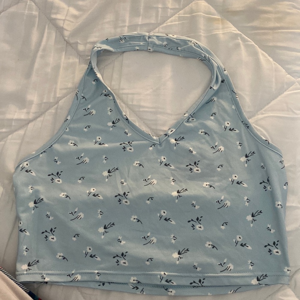 Cute tank top colored baby blue with white floral pattern